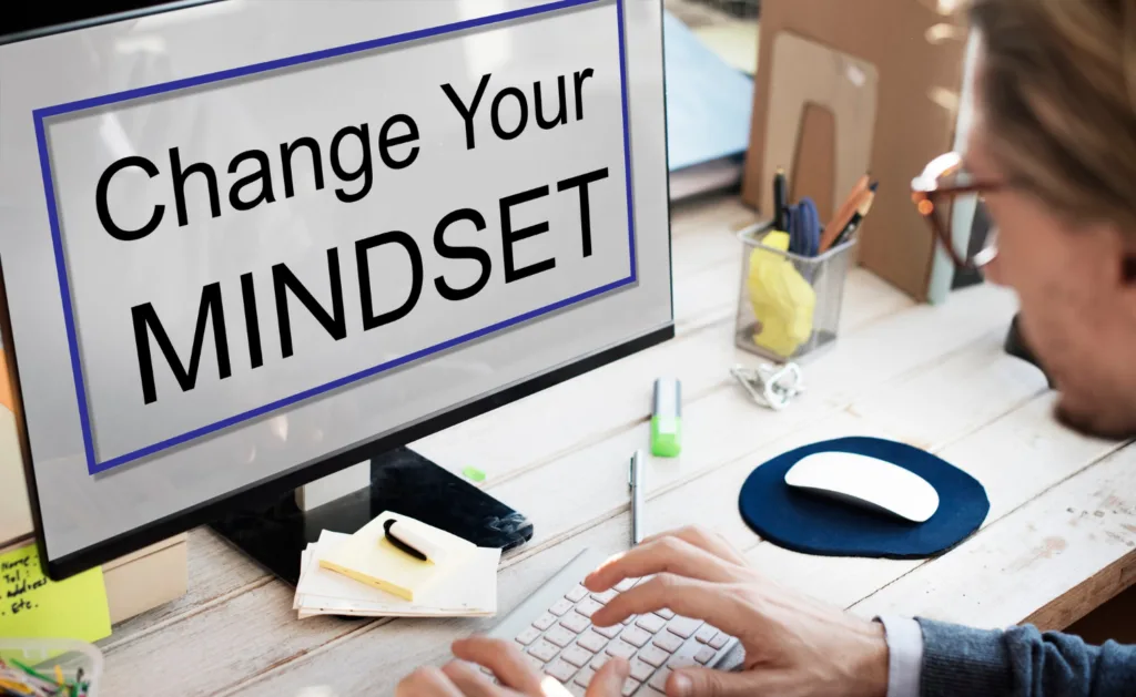 uma tela de computador com a frase: change your mindset.